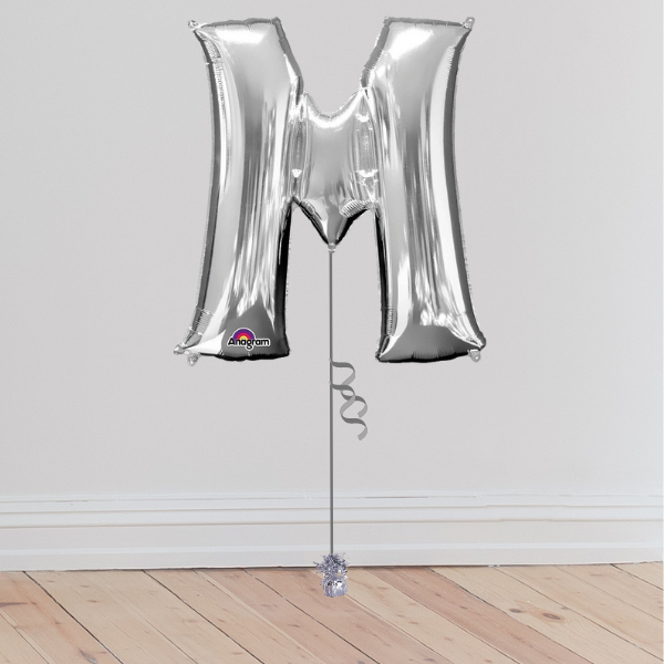 <b> ONLINE EXCLUSIVE </b> <br>Giant Silver Letter Balloon <br>(Inflated with Helium & Weight Included)