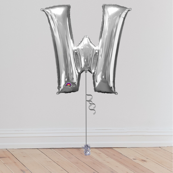 <b> ONLINE EXCLUSIVE </b> <br>Giant Silver Letter Balloon <br>(Inflated with Helium & Weight Included)