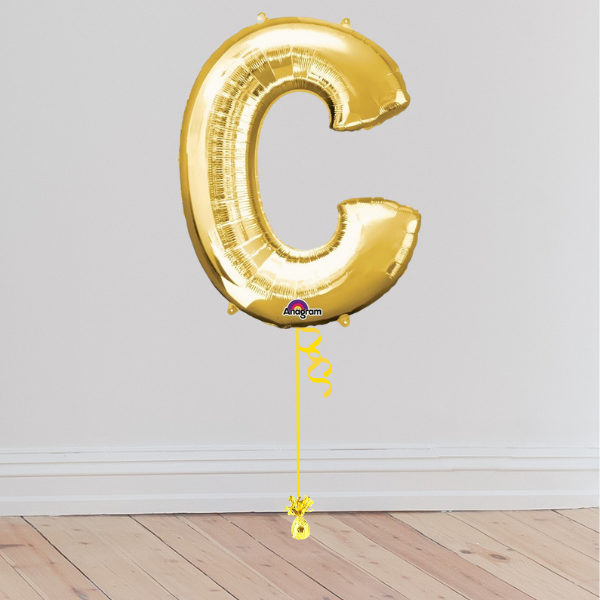 <b> ONLINE EXCLUSIVE </b> <br>Giant Gold Letter Balloon <br>(Inflated with Helium & Weight Included)