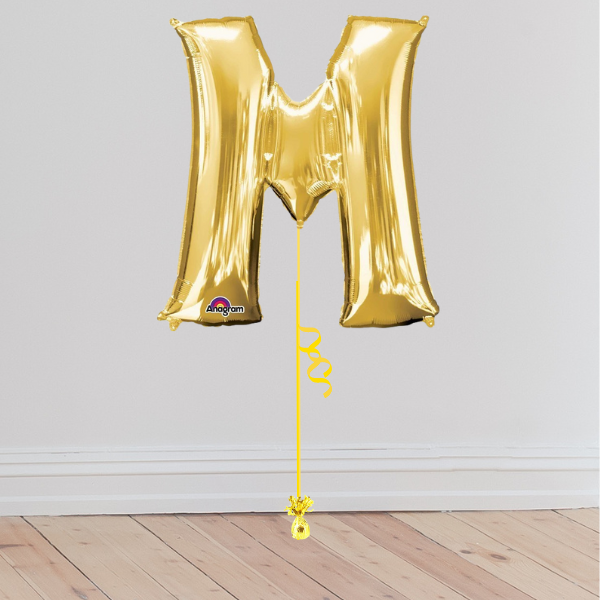 <b> ONLINE EXCLUSIVE </b> <br>Giant Gold Letter Balloon <br>(Inflated with Helium & Weight Included)