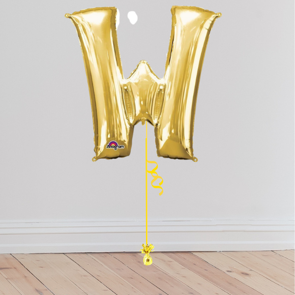 <b> ONLINE EXCLUSIVE </b> <br>Giant Gold Letter Balloon <br>(Inflated with Helium & Weight Included)