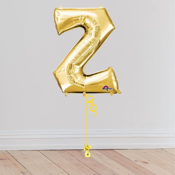 <b> ONLINE EXCLUSIVE </b> <br>Giant Gold Letter Balloon <br>(Inflated with Helium & Weight Included)